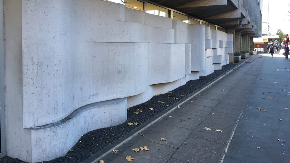 Wave-like wall that is part of the Brutalist structure,  photo: Ian Willoughby